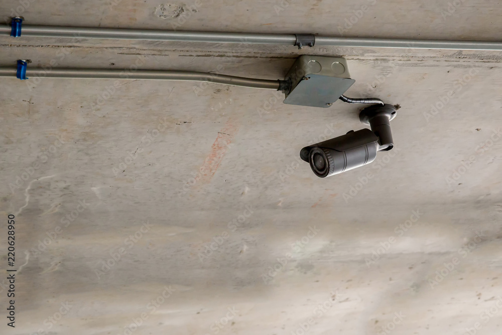 CCTV security camera.closed circuit camera surveillance on pole of office building Safety system area control in rainy day and copy space Concept for Security equipment in everyday life Of everyone