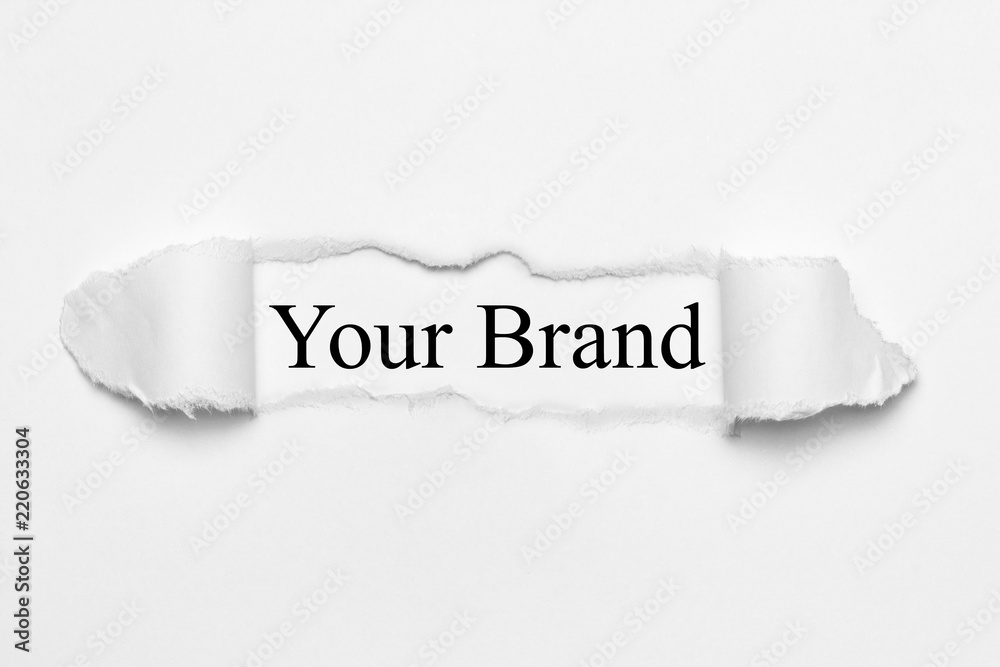 Your Brand on white torn paper Your Brand on white torn paper