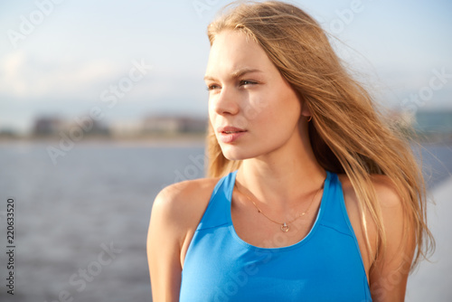 Image of a girl with Golden hair on the Bay. 