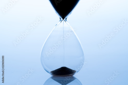 Sand clock, business time management concept photo