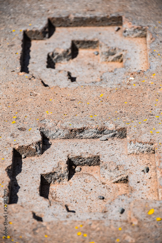 Elaborate stone carving in megalithic stone at Puma Punku, part of the Tiwanaku archaeological complex, a UNESCO world heritage site near La Paz, Bolivia. photo