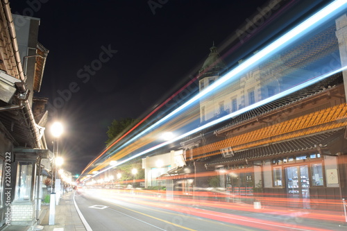 Passing cars at night, in Koedo Kawagoe, Japan photo