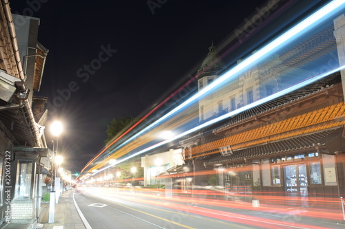 Passing cars at night, in Koedo Kawagoe, Japan