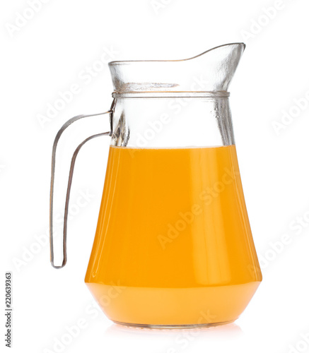 Orange juice in pitcher Isolated on a white background