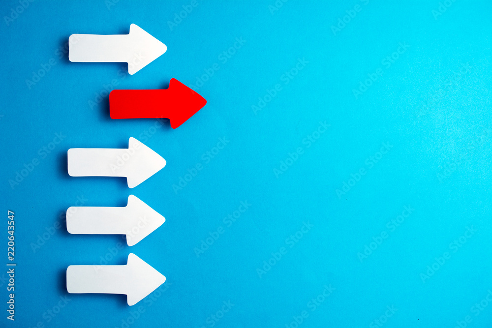 white arrows on a blue background. leadership purposefulness self-development concept white arrows on a blue background. leadership purposefulness self-development concept