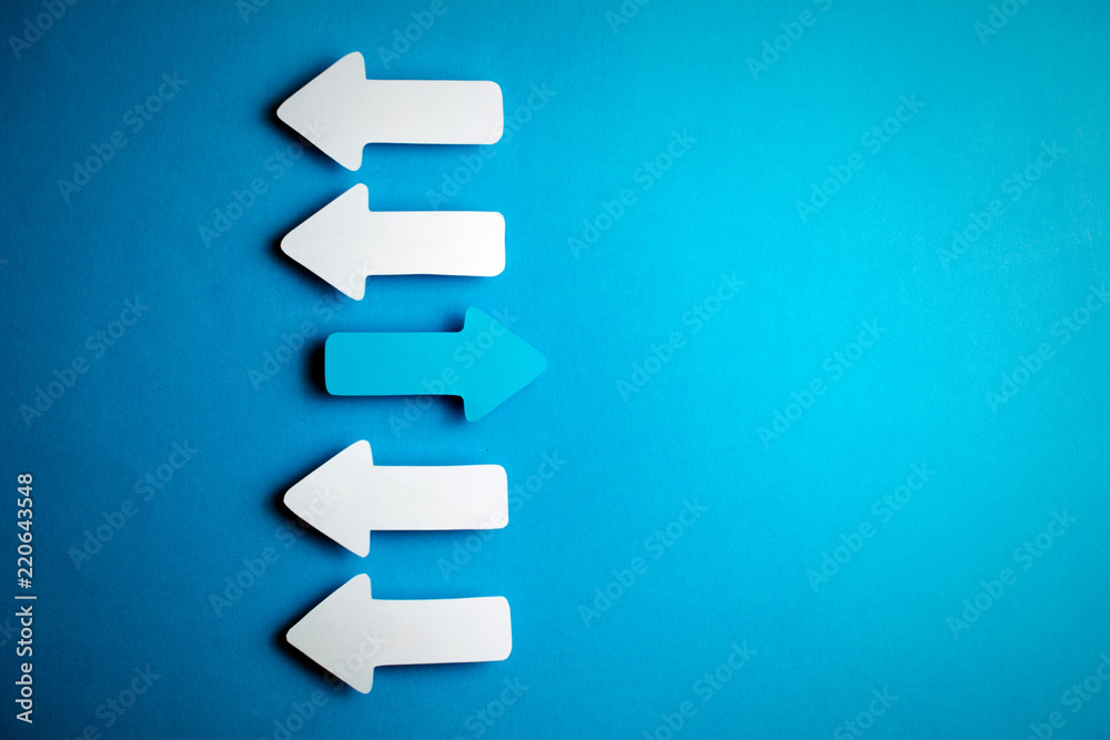 white arrows on a blue background. leadership purposefulness self-development concept