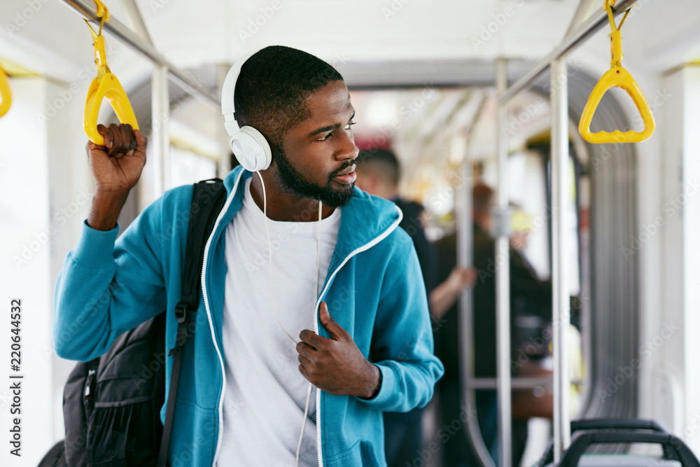 Man In Headphones Listening Music Riding In Transport Stock Photo
