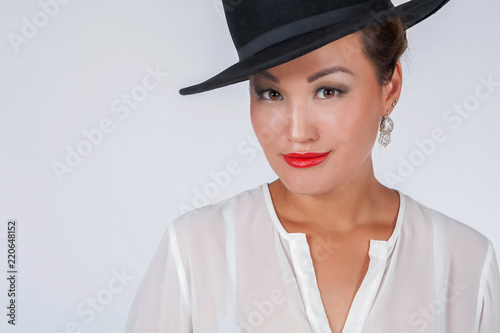 Girl with red lips. Asian g...