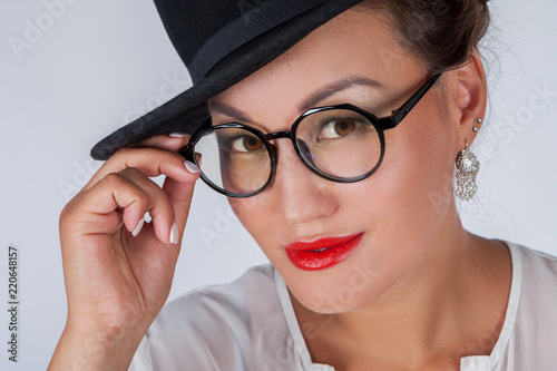 Girl in glasses. The woman ...