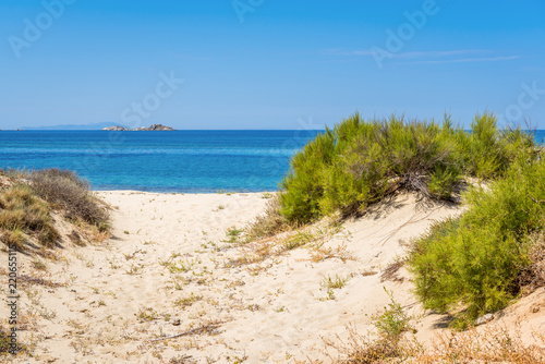 Sand dunes and sea in summer day on Naxos island  Greece
