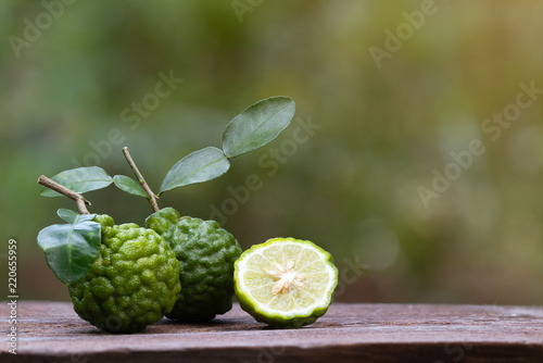 fresh bergamot fruit on wooden table background