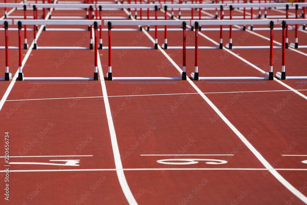 Hurdles on competition background