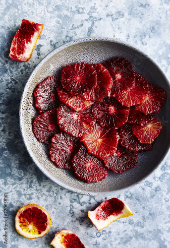 Freshly sliced blood oranges photo