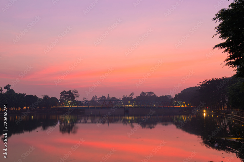 Sunrise sky view over a bridge at Cisadane River, Tangerang, Indonesia.