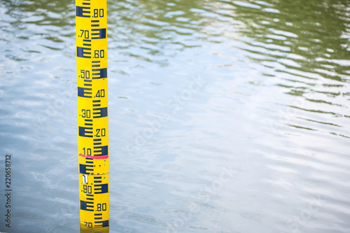 Water level meter located in the water of the dam. Concepts for natural resources. Water level gauges in the background is the reservoir of water 