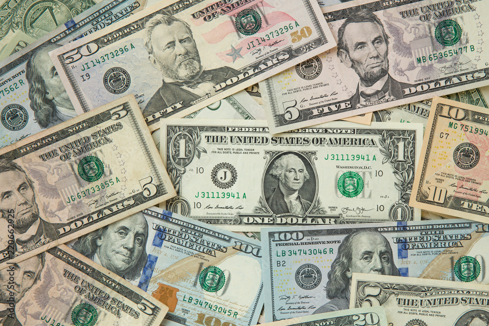 money american hundred dollar bills Pile of various currencies isolated on white background.Closeup of assorted American banknotes.US currency scattered on the table.america currency dollor currency. money american hundred dollar bills Pile of various currencies isolated on white background.Closeup of assorted American banknotes.US currency scattered on the table.america currency dollor currency.