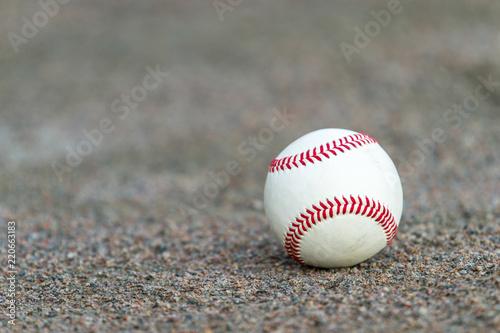 one baseball on infield of sport field