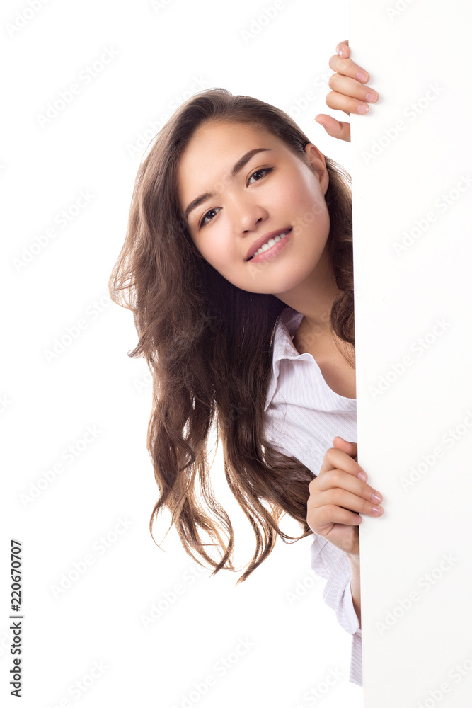 Young smiling asian woman showing blank white placard. Young smiling asian woman showing blank white placard.