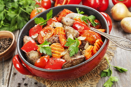 Chicken liver with sweet pepper and tomatoes