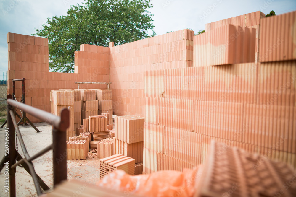 Rough construction of the two-storey house with basic wall, foundation ...