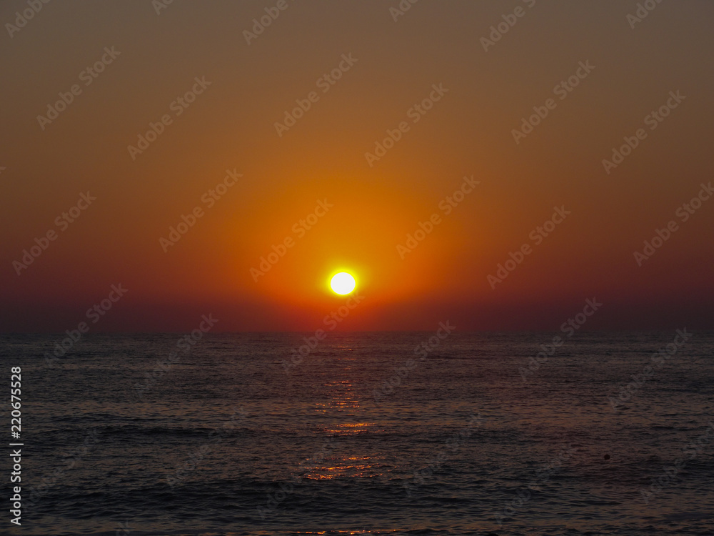 Beautiful red sunset. Natural Sunset Sunrise .Bright Dramatic Sky And Dark Ground. Landscape Under Scenic Colorful Sky. Beautiful red sunset. Natural Sunset Sunrise .Bright Dramatic Sky And Dark Ground. Landscape Under Scenic Colorful Sky.
