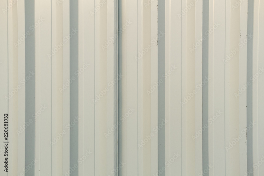 Textured metal wall in white color. Textured metal wall in white color.