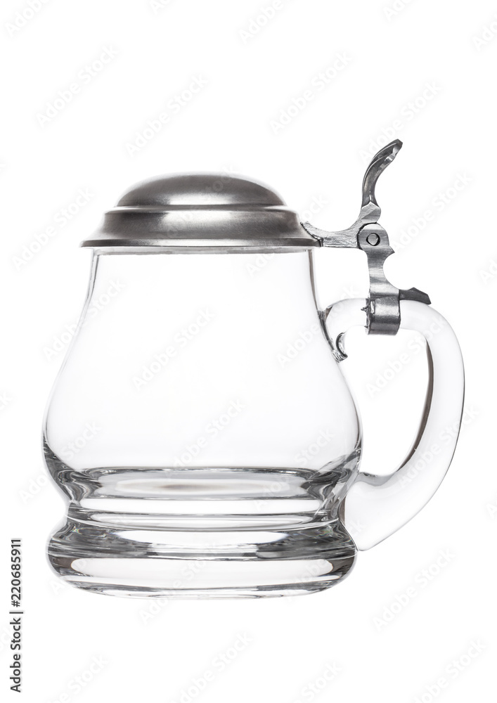 Obraz premium Empty vintage retro beer glass. Glass handle with silver steel top.