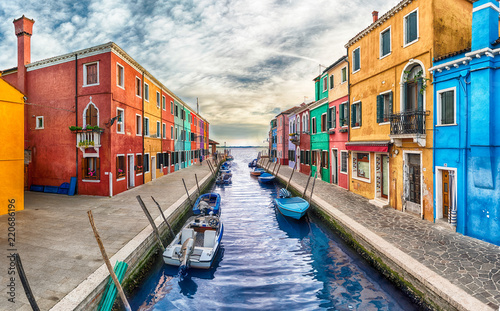 Colorful houses along the canal, island of Burano, Venice, Italy