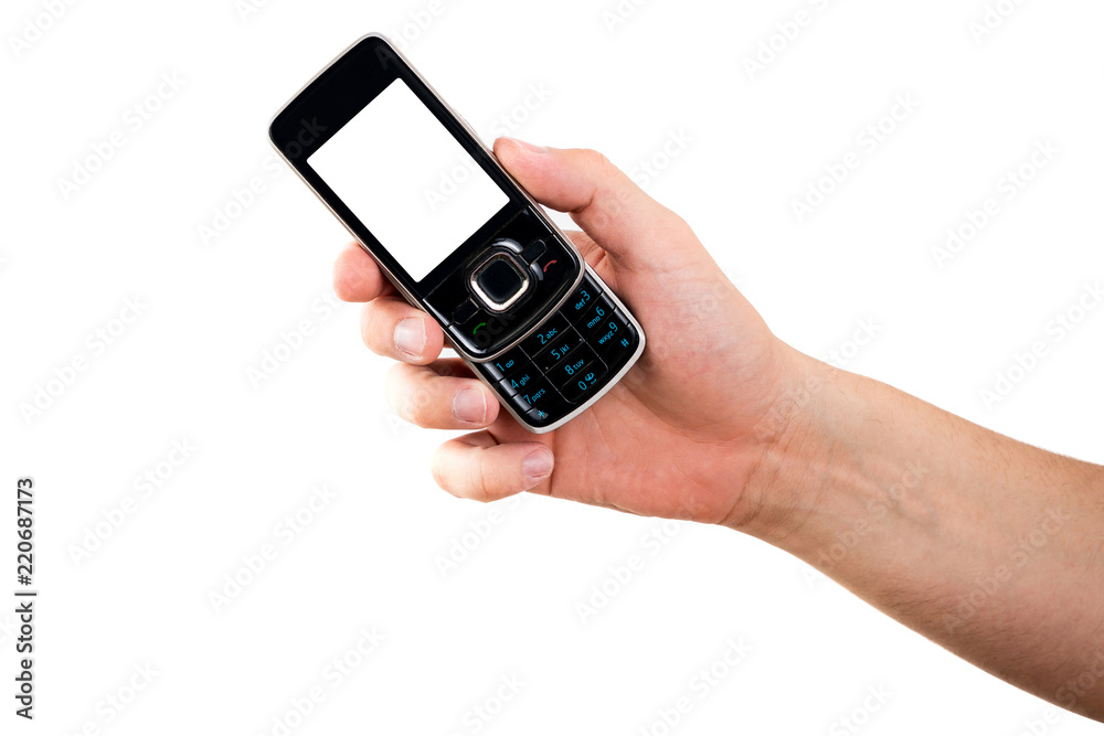 Old, classic Phone in hand. Black telephone with a white, blank display isolated on a white background. Content completion concept. Retro Telephone hand held by the side. Old, classic Phone in hand. Black telephone with a white, blank display isolated on a white background. Content completion concept. Retro Telephone hand held by the side.