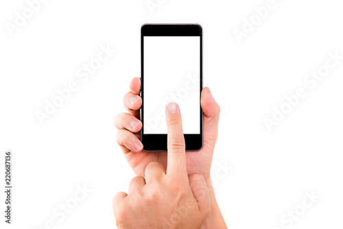 Mobile phone in hand. Black smartphone held by the hand isolated on a white background. Hand holding a black phone with a blank display with a finger clicking on the screen.