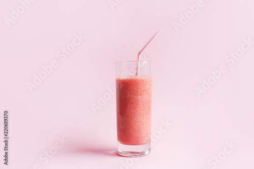 Wallpaper Mural Strawberry smoothie or milkshake in glass on pink pastel background Torontodigital.ca