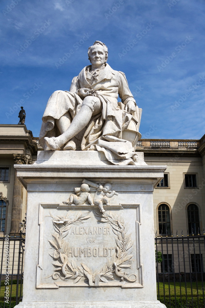 Alexander von Humboldt statue outside Humboldt University from 1883 by Reinhold Begas, Berlin, Germany, sunny day
