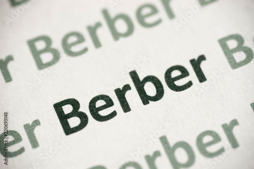 word Berber language printed on paper macro