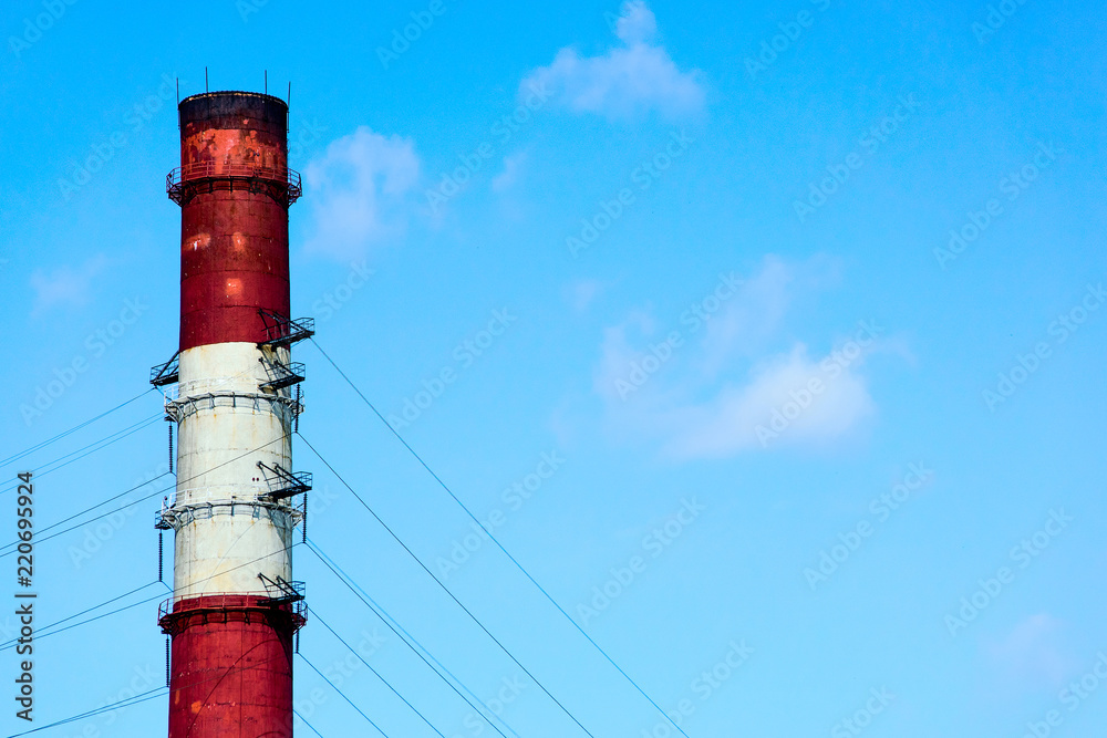 Industrial pipe against the background of a clear sky Industrial pipe against the background of a clear sky