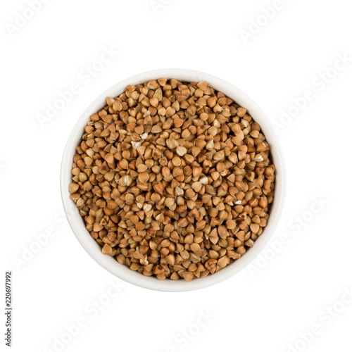 Bowl of Dry Buckwheat Grains Isolated on White Background Top View