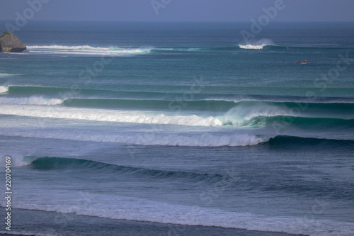 Nice waves big swell during sunset session at a surfer spot in Bali, Indonesia Uluwato, Bingin
