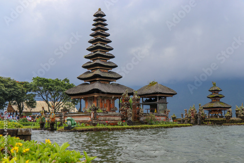Temple in Bali Indonesia next to a mountain lake. Pura Ulun Danu Bratan  Bali. Hindu temple on Bratan lake.