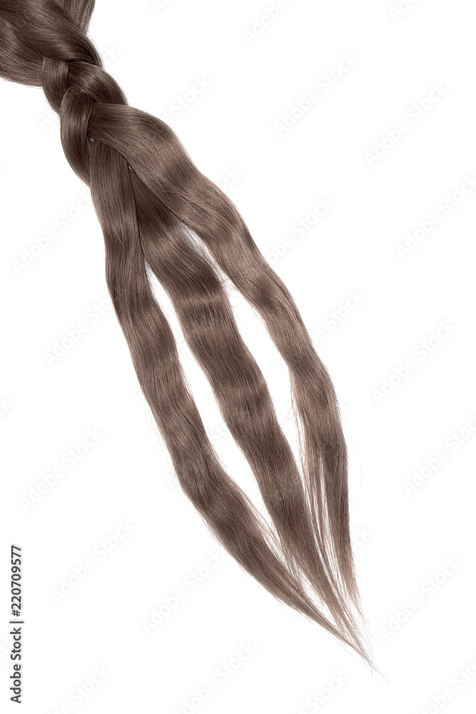 Brown hair isolated on white background. Loose braid