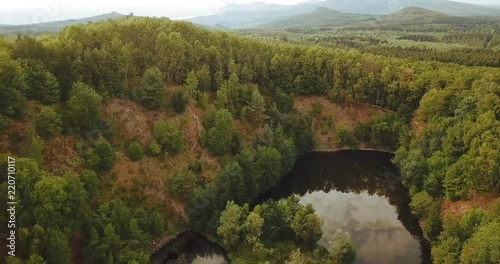 Aerial shot of Asberg forest lake in Germany photo