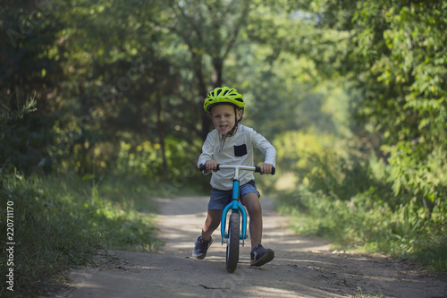 Fototapeta Naklejka Na Ścianę i Meble -  Young boy on balance bike
