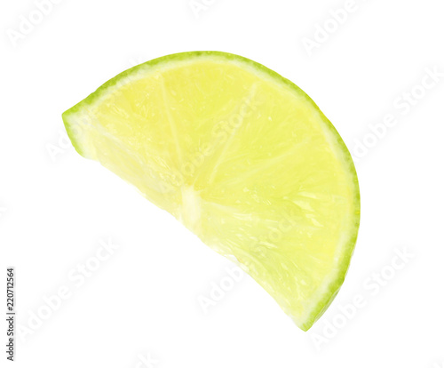 Slice of fresh lime on white background