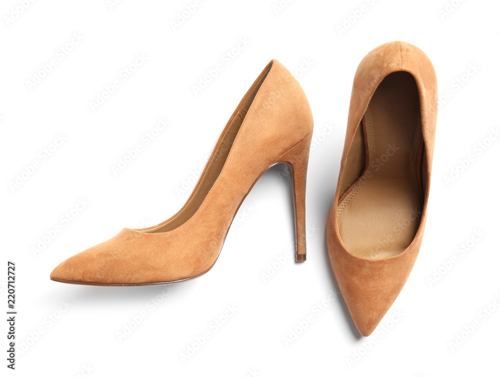 Pair of beautiful shoes on white background, top view