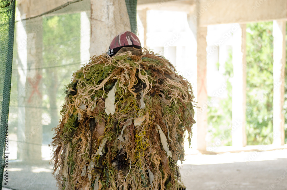 Sniper ghillie suit inside building back view Stock Photo | Adobe Stock