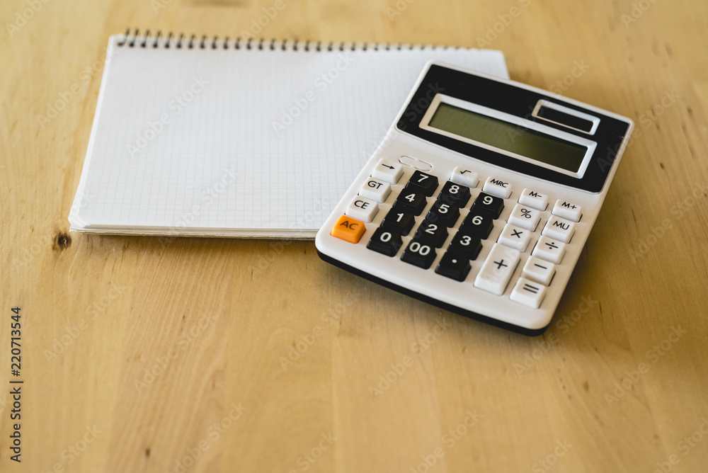 Calculator and pad to calculate business expenses Calculator and pad to calculate business expenses