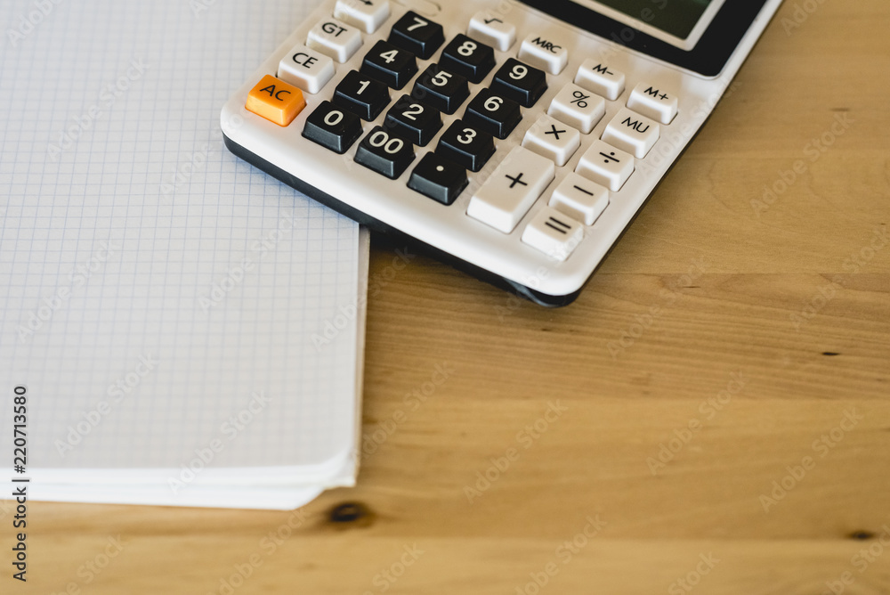 Calculator and pad to calculate business expenses Calculator and pad to calculate business expenses