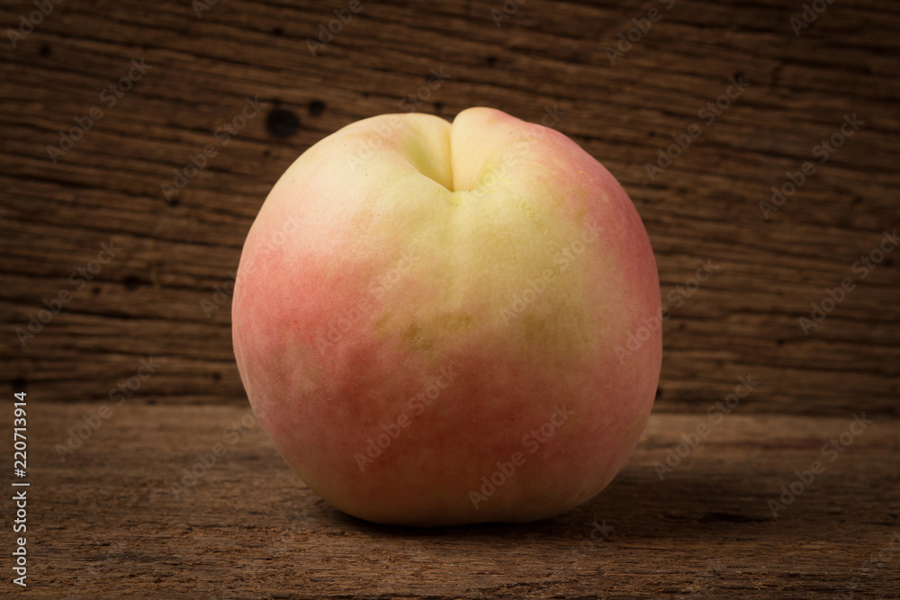peach on old wood. sunlight peach on old wood. sunlight