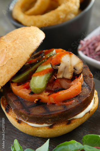 prepared vegan seitan burger meal