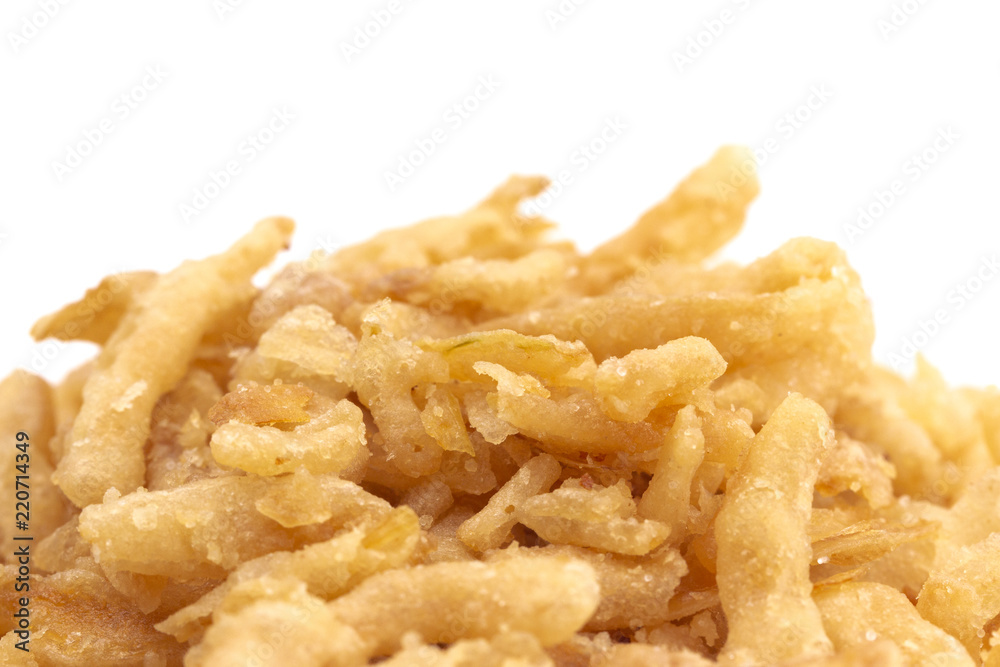 Crispy Fried Onions on a White Background Crispy Fried Onions on a White Background