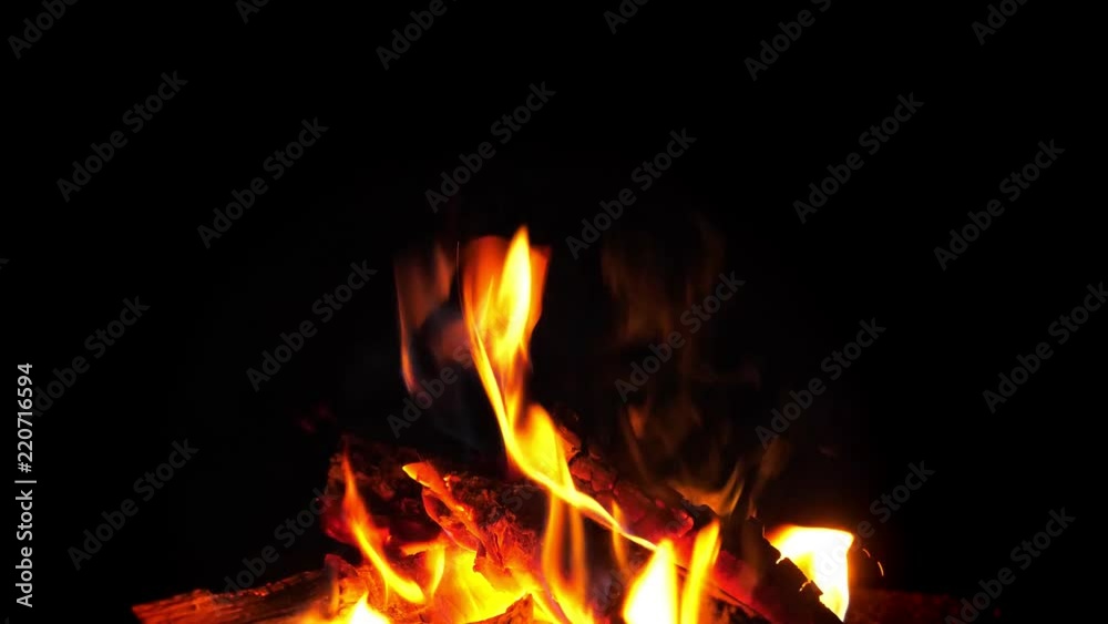 Flame of fire at bonfire in the dark Flame of fire at bonfire in the dark