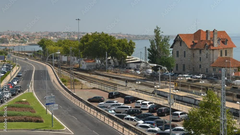 High perspective view of busy traffic near Cascais, Portugal overlooking the Portuguese Riviera High perspective view of busy traffic near Cascais, Portugal overlooking the Portuguese Riviera